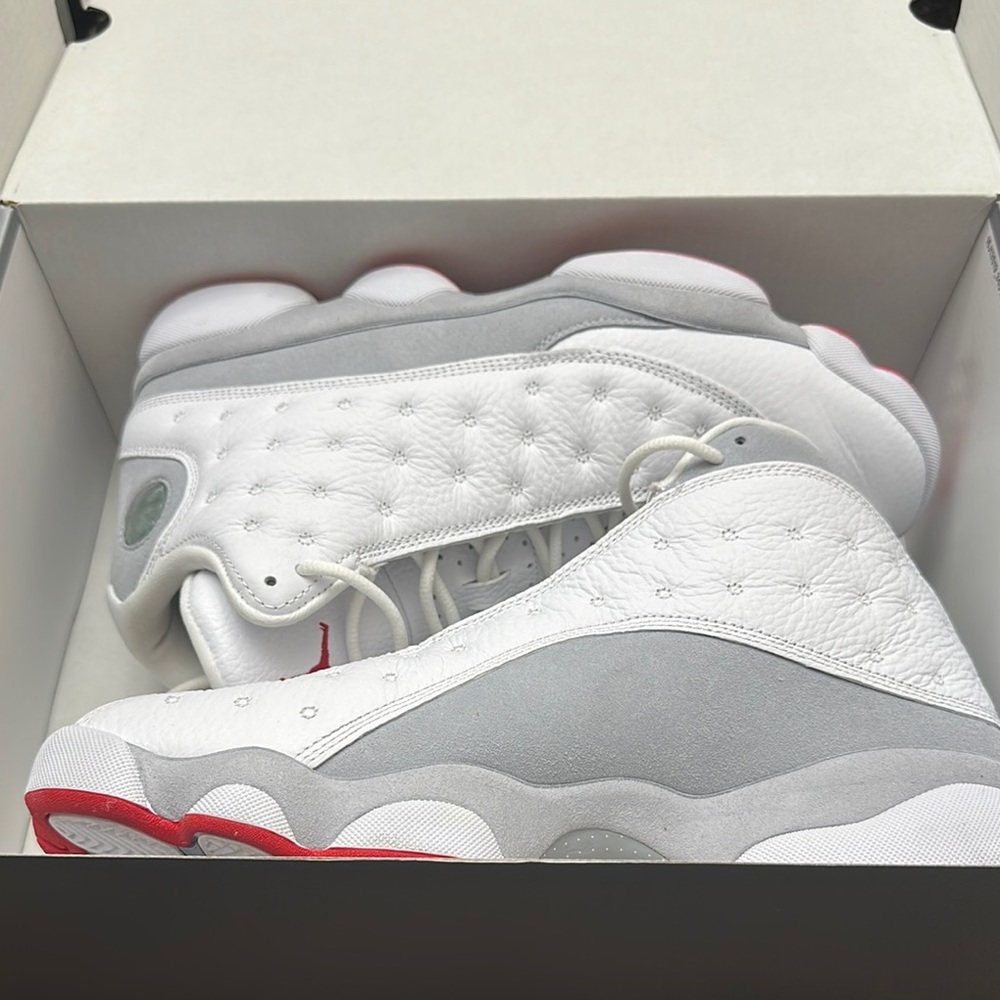 Air Jordan 13s Retro. White and Gray with Red Accents